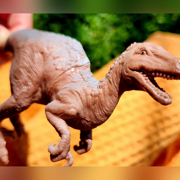 Velociraptor Dinosaur Solid Plastic Educational Toy. 7"L x 4"H. - Picture 2 of 4
